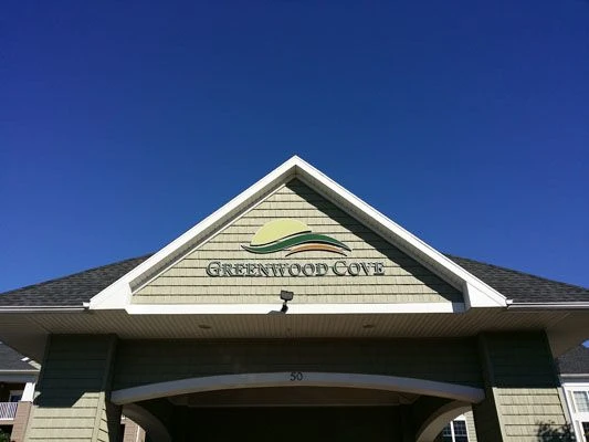 Dimensional sign of building living community name Rochester NY
