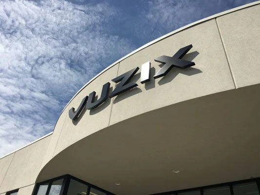 Outdoor company logo halo lit Rochester NY