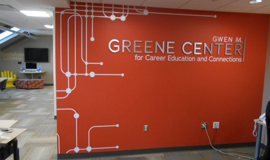 Dimensional letters with a wall graphic create a layered look!