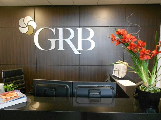 Brushed metal company logo dimensional lettering Rochester NY