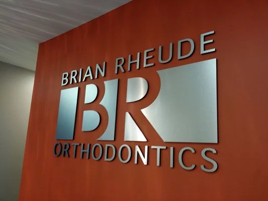 Brushed metal orthodontic office sign Rochester NY