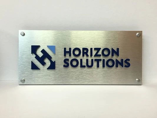 Company logo brushed aluminum dimensional letters Rochester NY