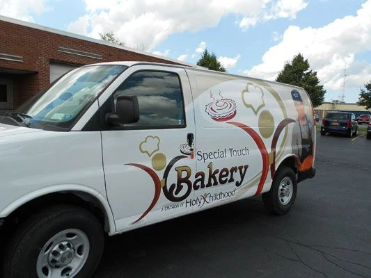 Nonprofit vehicle wrap design and installation Henrietta NY